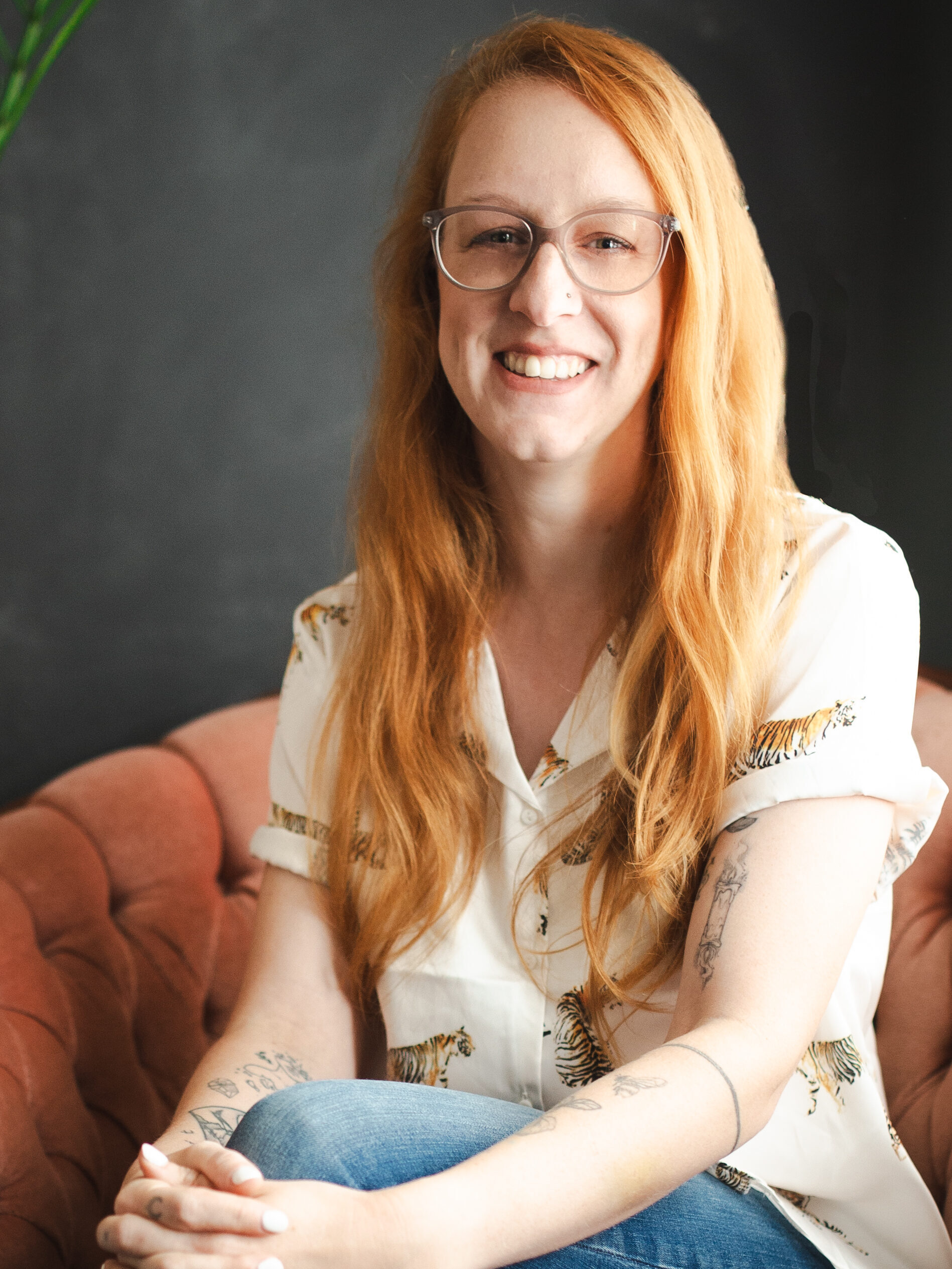 A headshot of Kirsten Mould, founder of Peridot Designs, a wallpaper installation service in London, Ontario.